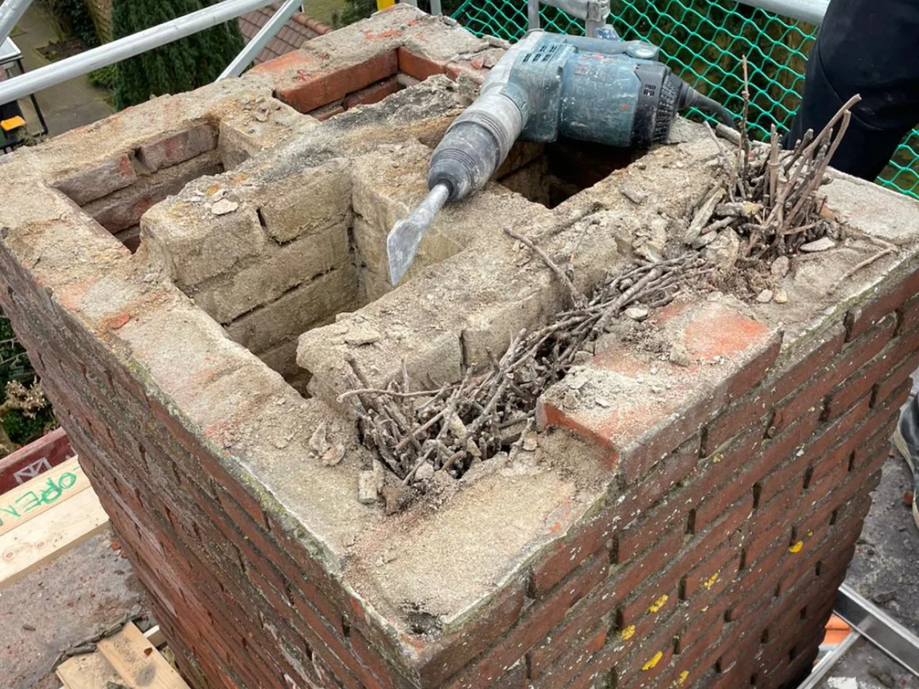 Chimney removal - Breaking out the chimney